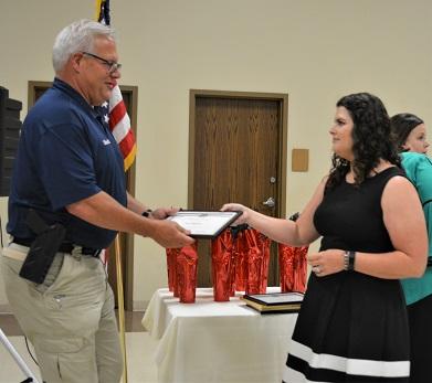 Sheriff Woods accepts the Outstanding Volunteer Award from LSU AgCenter Extension Agent Francis Guidry NEWSLETTER READY.jpg