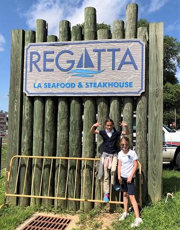 22 Reed and Borne at Regatta sign NEWSLETTER READY.jpg